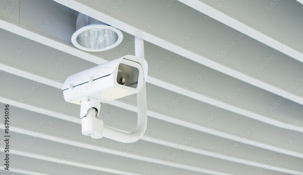 Closed-circuit television,CCTV Camera Operating inside a airport and train station or department store,use video ransmit a signal to a specific place,on white background with clipping path. Closed-circuit television,CCTV Camera Operating inside a airport and train station or department store,use video ransmit a signal to a specific place,on white background with clipping path.