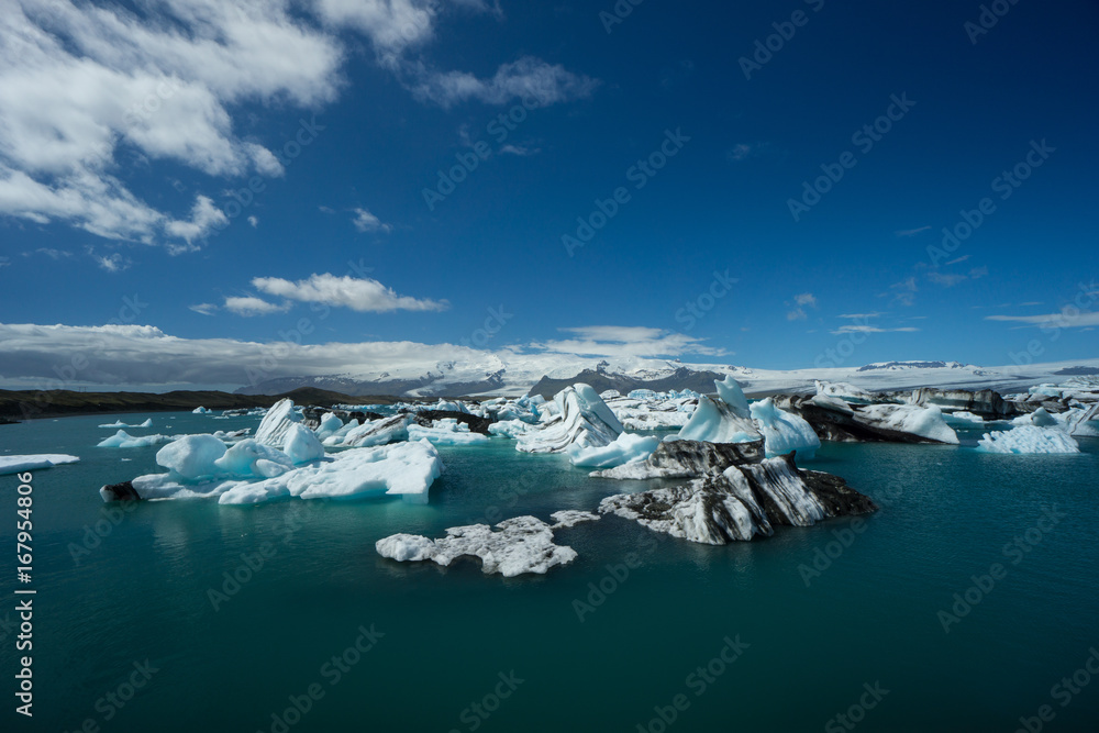 Iceland - Aerial photograph of many huge ice floes and blue water Iceland - Aerial photograph of many huge ice floes and blue water