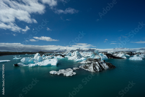 Iceland - Aerial photograph of many huge ice floes and blue water