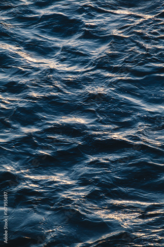 Dark blue ocean water photo