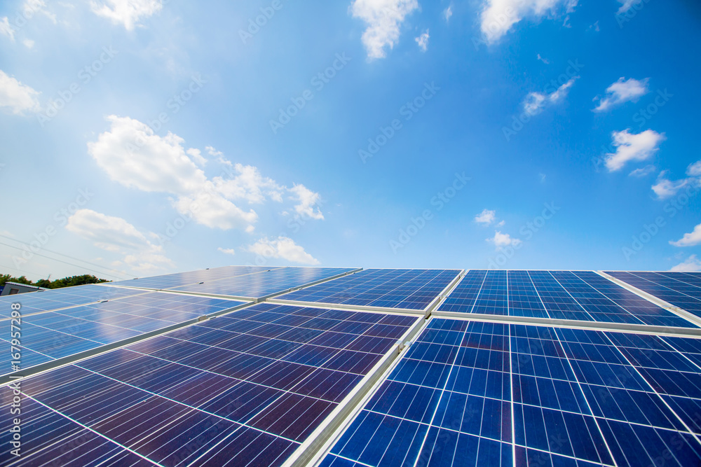 Solar panels on the sky background. Solar power plant. Blue solar panels. Alternative source of electricity.