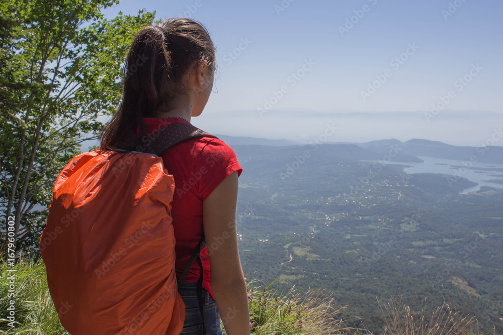 Eco tourism and healthy lifestyle concept. Young hiker girl end boy with backpack. Active hikers