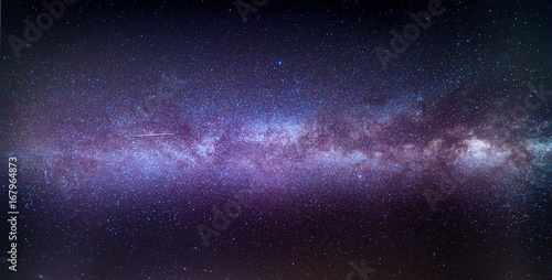 A meteor or shooting star streaks through the Milky Way during the 2017 Perseid shower.