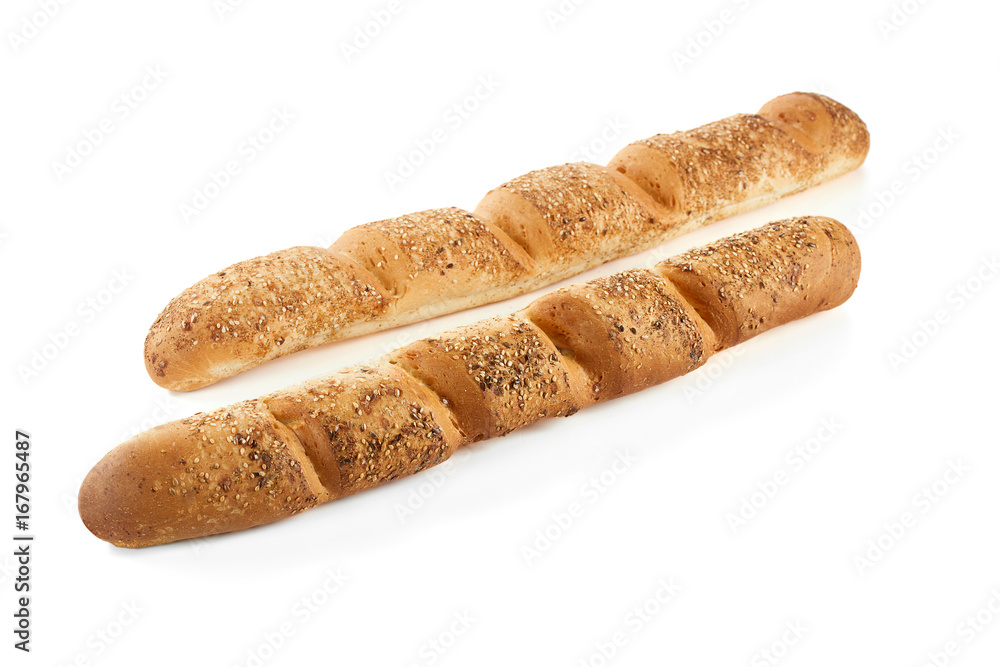 Two freshly baked baguettes isolated on white. Two freshly baked baguettes isolated on white.