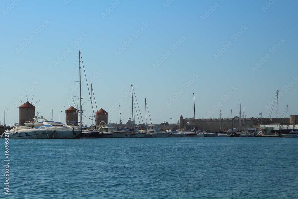 Mandraki harbour in Rhodes, Greece