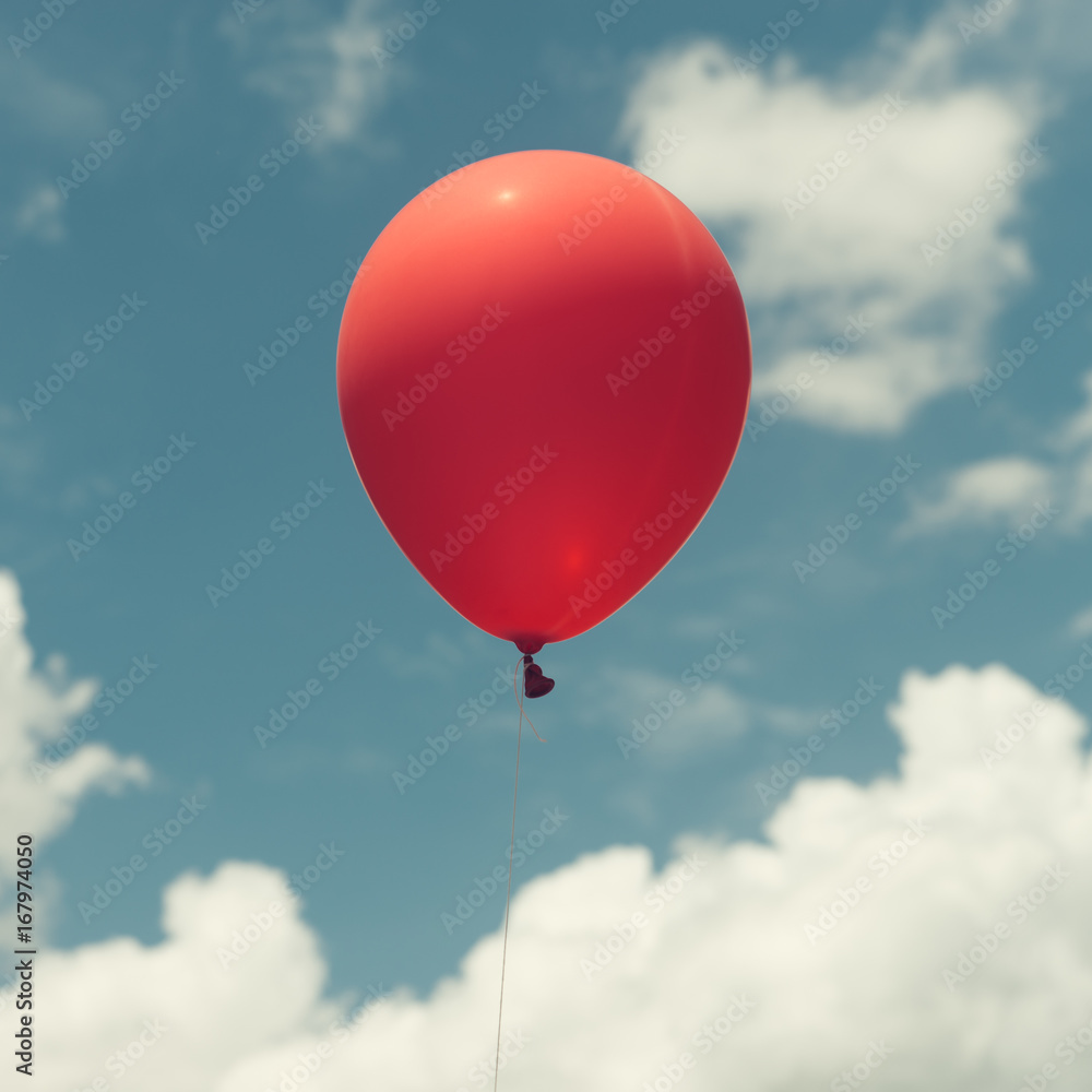 Fototapeta premium Lots of colorful balloons on the blue sky, concept of love in summer and valentine, wedding honeymoon. Vintage effect style pictures.