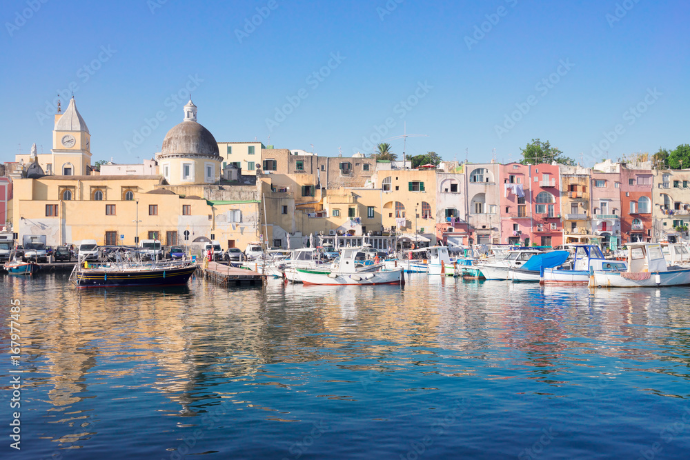 Port with colorful old houses of Procida island, Italy