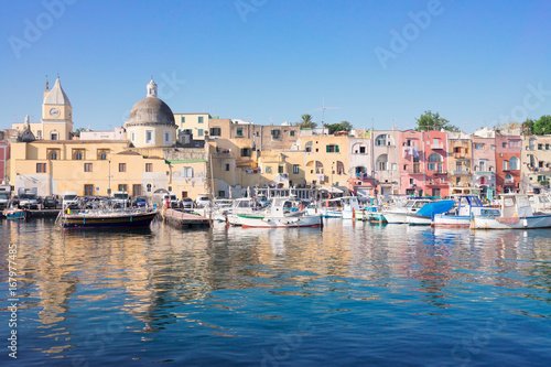 Port with colorful old houses of Procida island, Italy