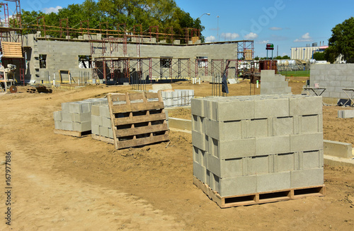 Concrete block commercial building under construction.