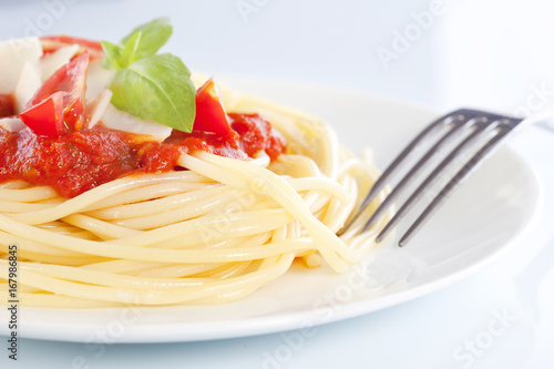 Spaghetti with tomato sauce and parmesan