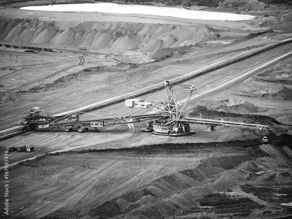 Fototapeta premium Giant conveyor in surface coal mine, Northern Bohemia, Czech Republic. . Black and white image.