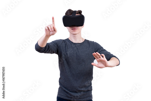 The man with glasses of virtual reality on white isolated background. © hurvajs