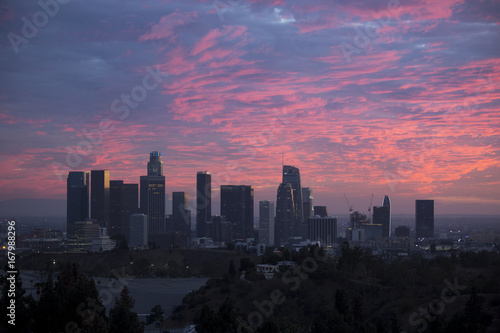 Pink sunset over city © matthew