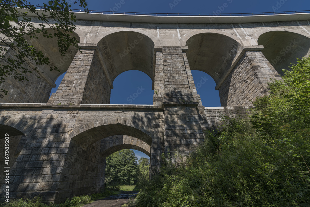 Stone rail viaduct near Sychrov village