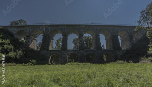 Stone rail viaduct near Sychrov village photo