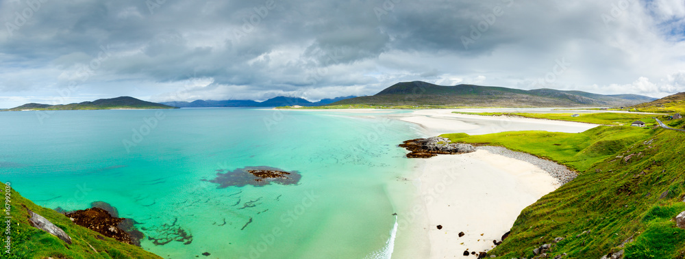 Fototapeta premium Panoramic view of Luskentyre white beaches under dramatic sky, Isle of Harris, Scotland