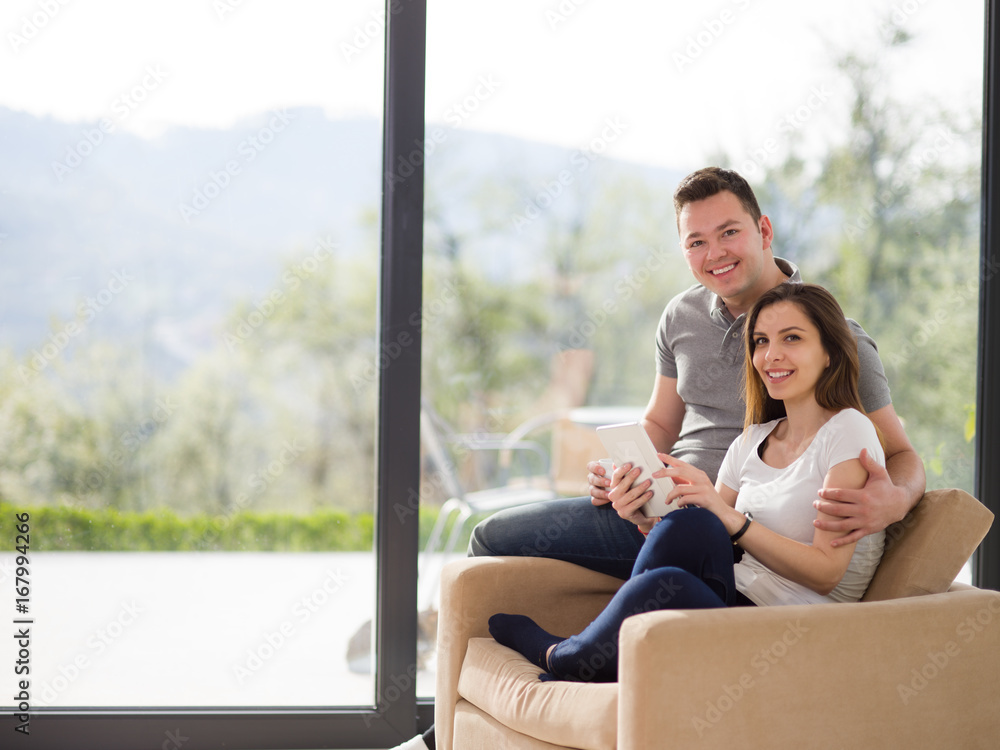 couple using tablet at home