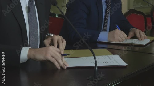 Sign a contract business people