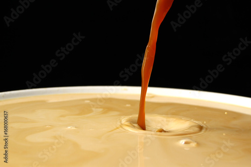 Milk and Coffee background   Coffee drinks are made by brewing hot water with ground coffee beans. 