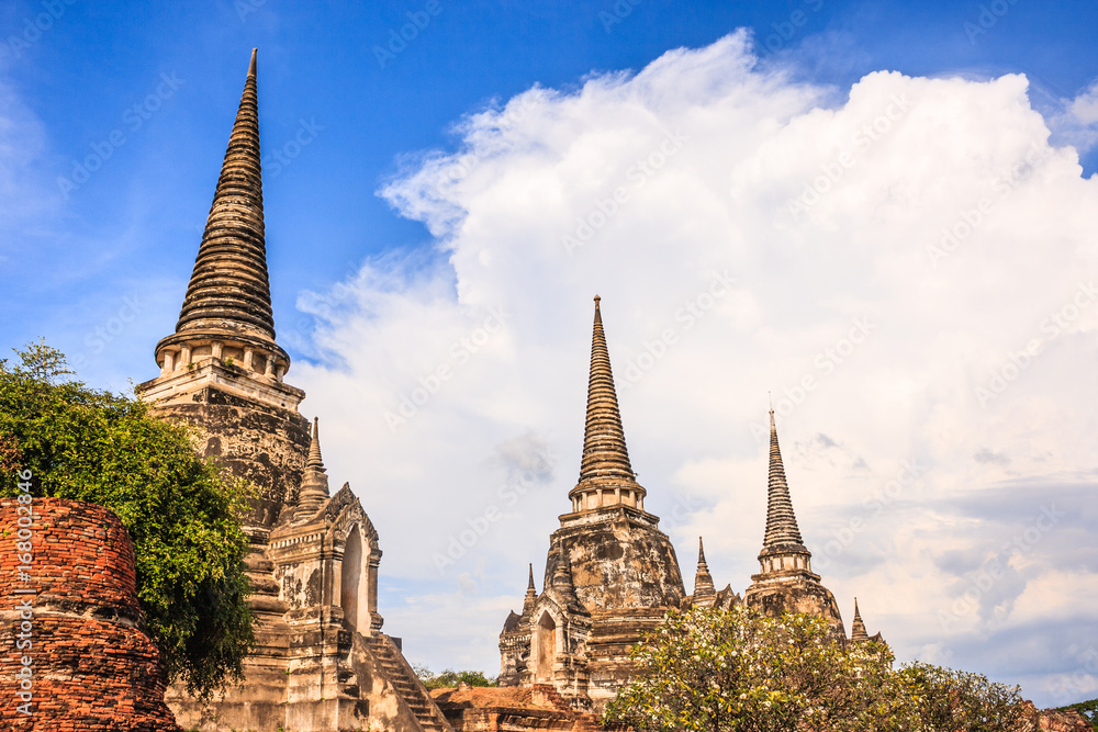 View of asian religious architecture ancient Pagodas in Wat Phra Sri Sanphet Historical Park, Ayuthaya province, Thailand, Southeast Asia. Thailand's top historic landmark, attraction and destination