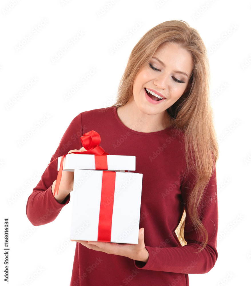 Beautiful lady opening gift box against white background Beautiful lady opening gift box against white background
