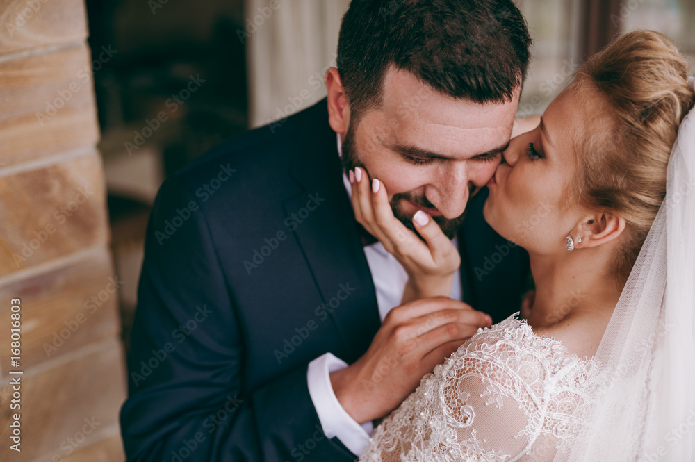 Fototapeta premium Beautiful bride and groom couple walking at the wedding