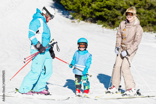 Family on a ski slope