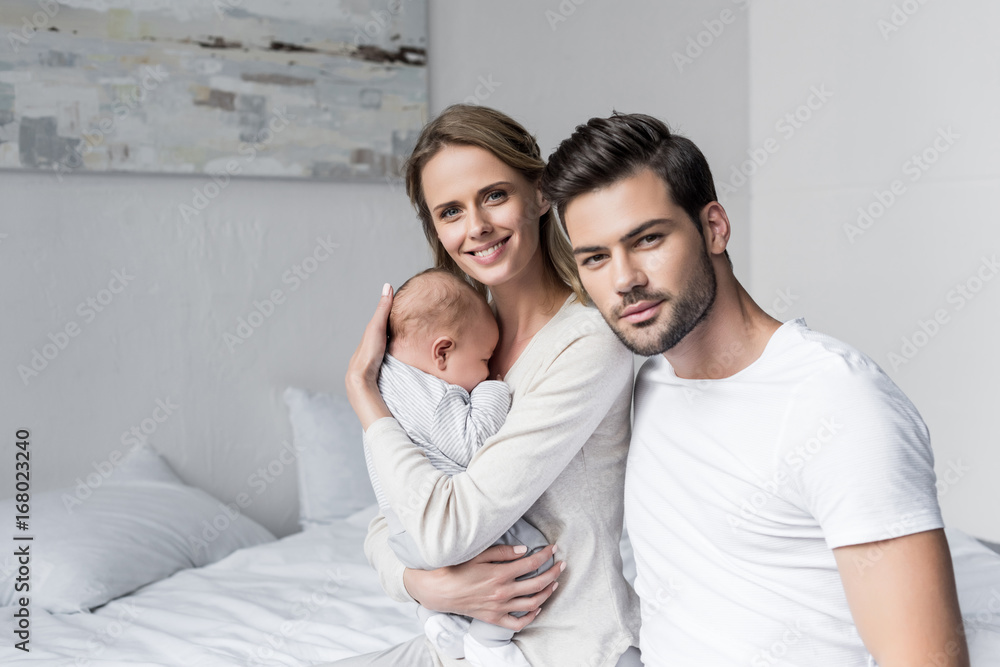 parents with cute baby parents with cute baby