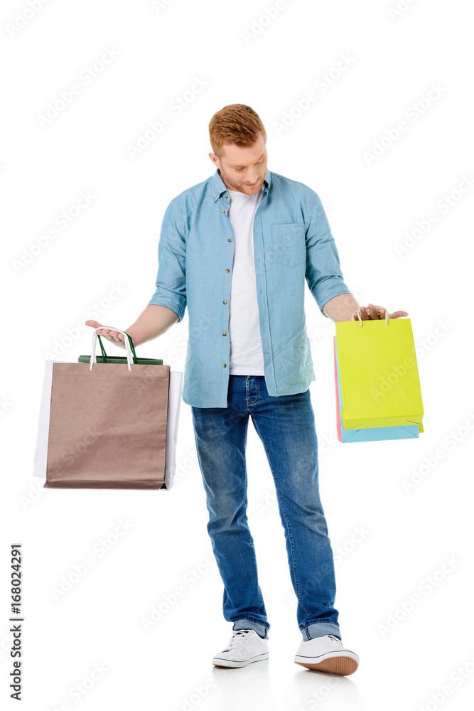 young man with shopping bags young man with shopping bags