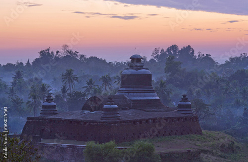 Famous ancient Htukkanthein stupa at sunset in Mrauk U, Rakhine state of Myanmar photo