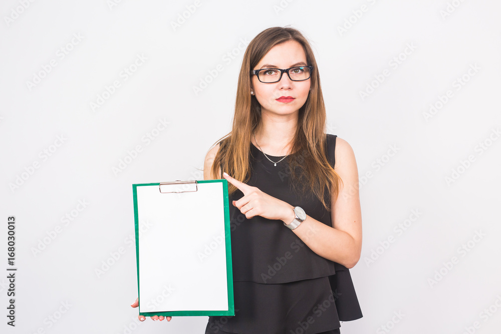 Portrait of young business woman holding a blank banner. image on a white studio background. business and lifestyle concept. Portrait of young business woman holding a blank banner. image on a white studio background. business and lifestyle concept.