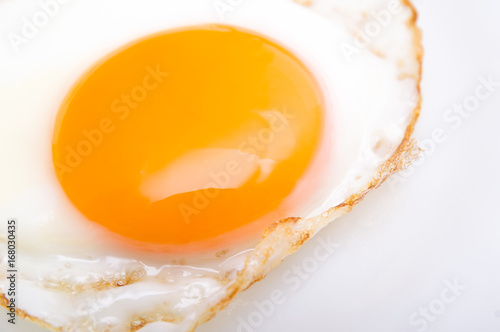Fried egg isolated on dish