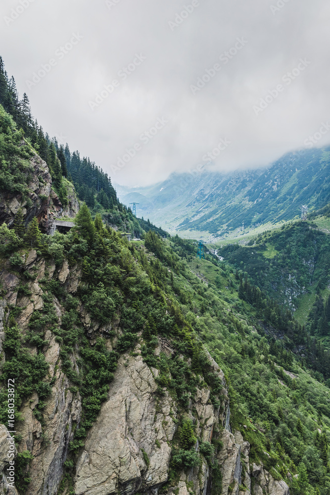 Obraz premium Carpathians nature landscape of rocky Fagaras mountains in cloudy weather at Romania, spectacular wilderness scenery