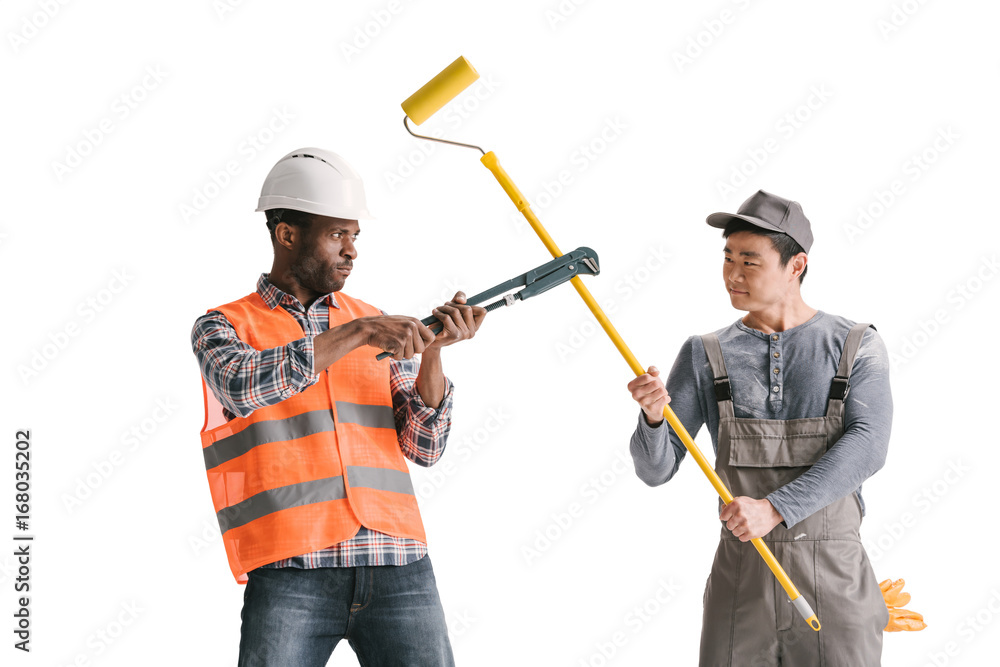 construction workers fighting with tools