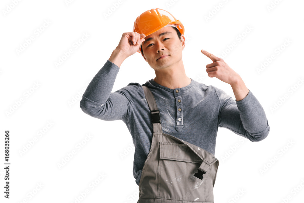 construction worker ponting at helmet construction worker ponting at helmet