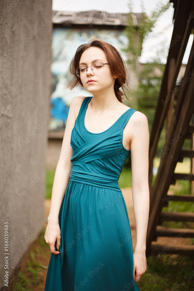 Fototapeta premium Young pretty women posing on old stairs