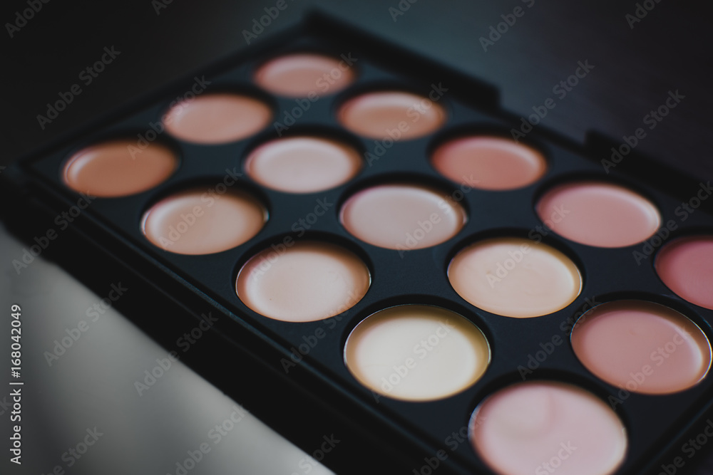 Palette shimmers highlighters on a dark Palette shimmers highlighters on a dark