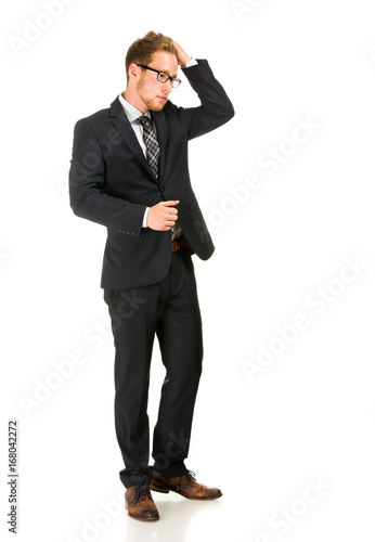 Young, handsome business man wearing black suit. © Margarita Borodina