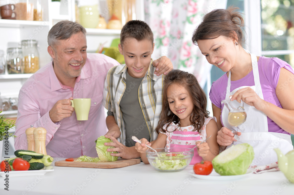 family cooking at kitchen family cooking at kitchen