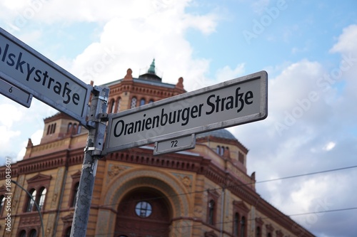 Berlin, Germany - August 13, 2017: Oranienburger Strasse street name sign. Oranienburger Strasse is a street in central Berlin, located in the borough of Mitte, north of the River Spree © cineberg