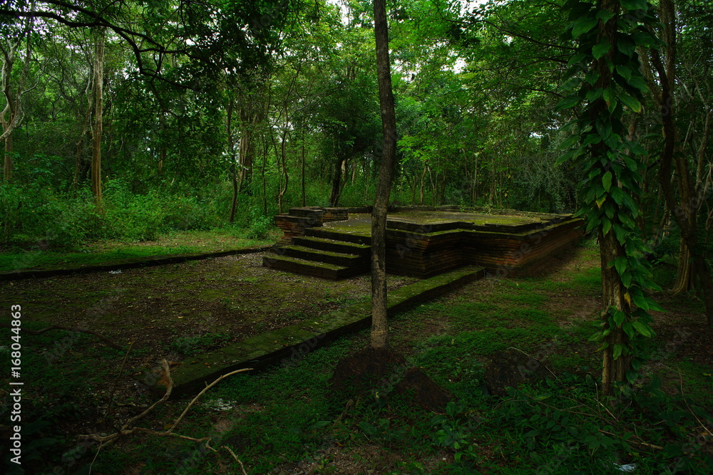 Archaeological site, ancient abandoned temple in Thailand's forest so