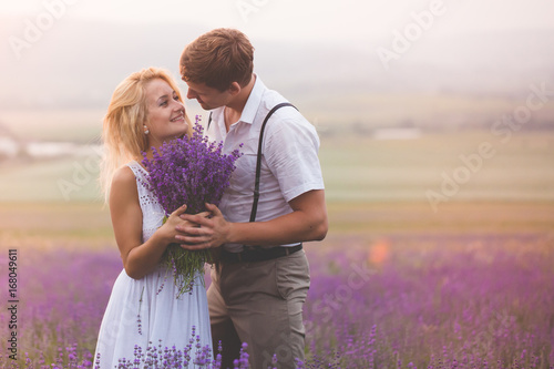 Beautiful couple on the lavender field