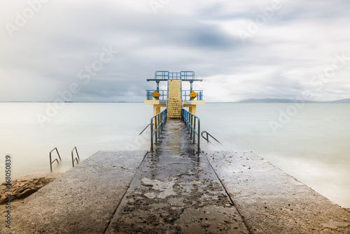 Sunrise on Blackrock Diving Tower, Salthill in Galway Ireland photo