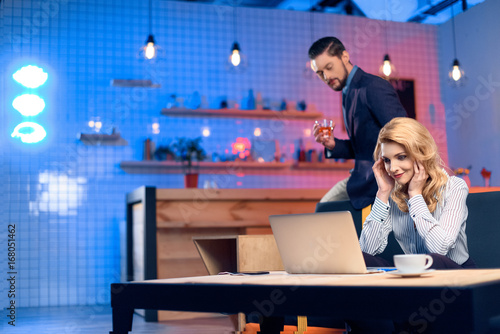 man flirting with woman in bar