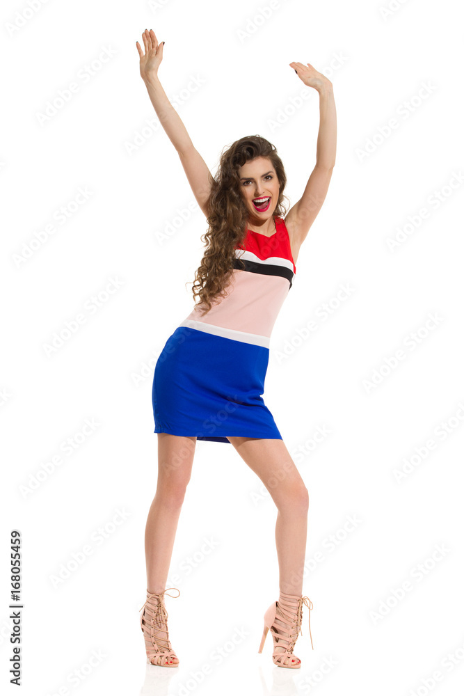 Excited Fashion Model In Mini Dress And High Heels Excited Fashion Model In Mini Dress And High Heels