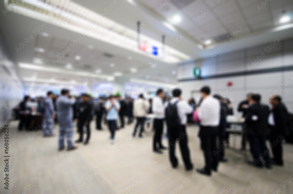 Blurred people walking in the hall.concept for blur background . Blurred people walking in the hall.concept for blur background .