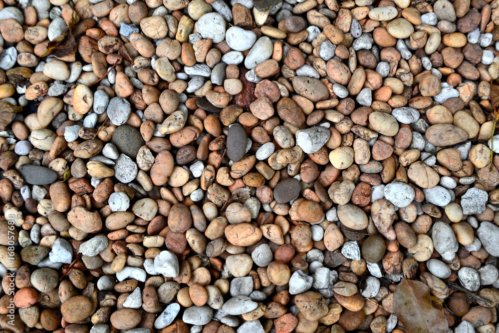 a texture or design of small stones, Stone background. a texture or design of small stones, Stone background.