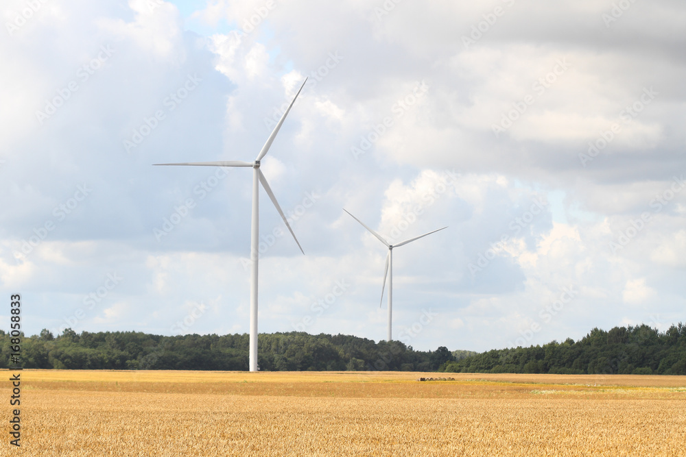 Countryside photo of windturbines working in action. Countryside photo of windturbines working in action.