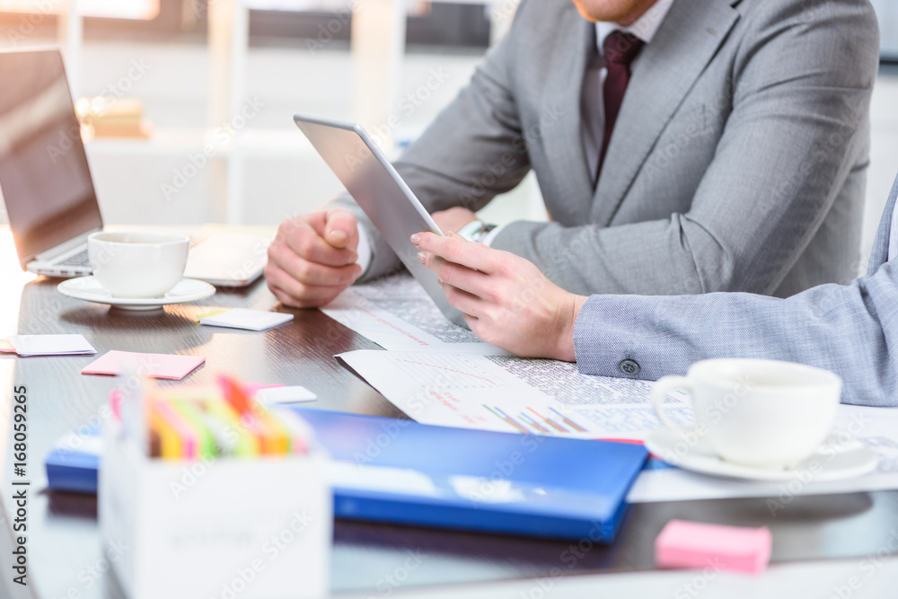 businesspeople using digital devices businesspeople using digital devices