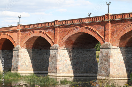 Old red brick classic bridge.